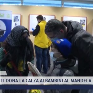 2022-01-06 FIRENZE - COLDIRETTI DONA LA CALZA AI BAMBINI AL MANDELA